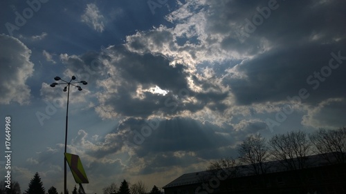 Clouds and sunrays over the meadow. Slovakia