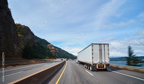 large freight truck on highway photo