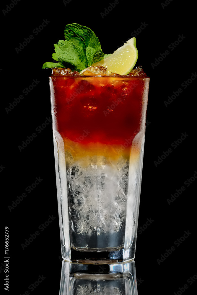 Cocktail with rum and cola with ice and lime in oldfashioned glass Cocktail with rum and cola with ice and lime in oldfashioned glass
