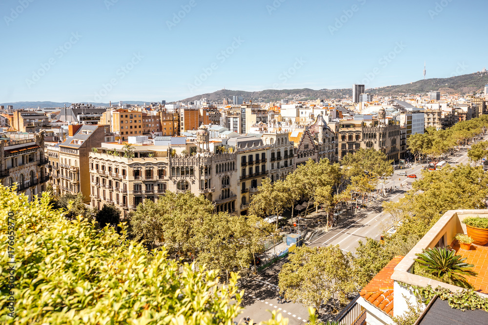 Fototapeta premium Top view on Gracia avenue with luxurious buildings in Barcelona city
