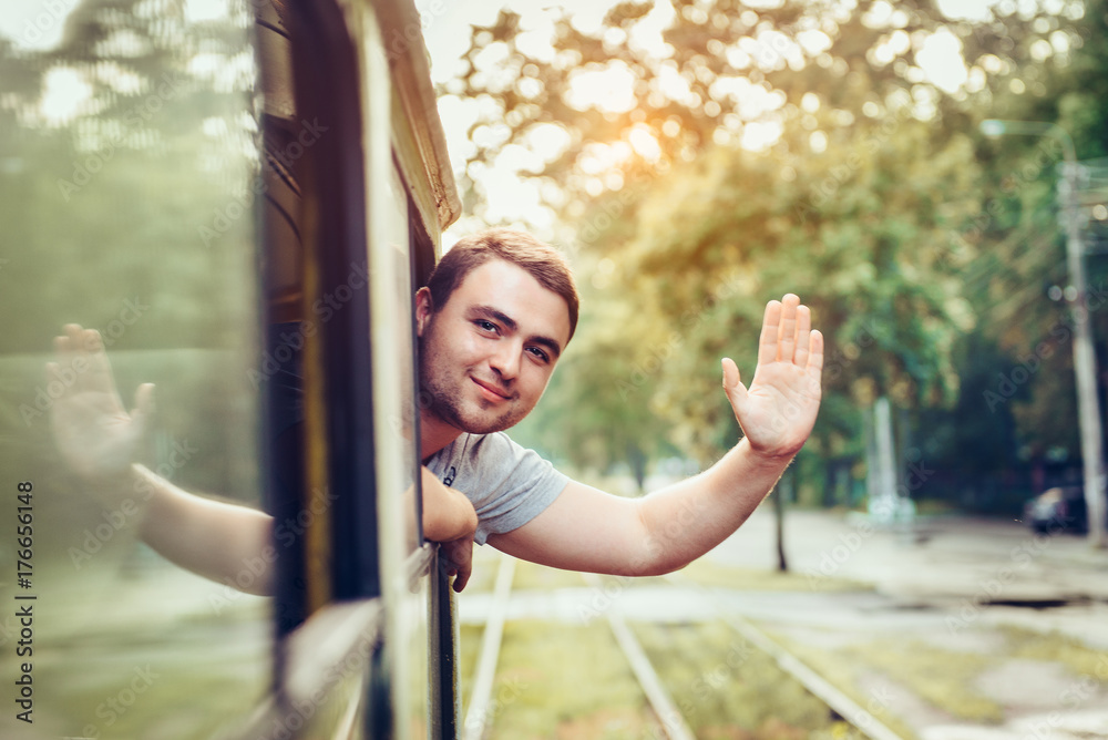 Happy man enjoy to use public transport in the city Happy man enjoy to use public transport in the city