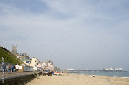 Looking along Cromer sea front to the pier and the town