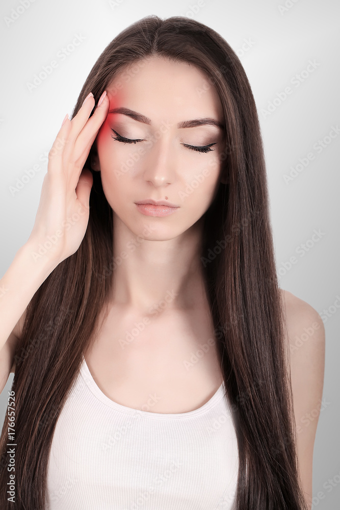 Headache, migraine and stress. The woman's worries frustrate a woman who suffers from headache. Young beautiful girl. Treatment. Migraine. Cold. Headache, migraine and stress. The woman's worries frustrate a woman who suffers from headache. Young beautiful girl. Treatment. Migraine. Cold.