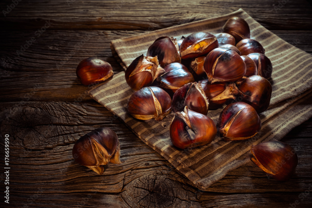 Roasted chestnuts on a towel Roasted chestnuts on a towel