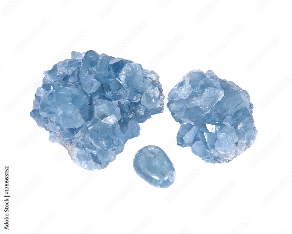 Blue celestite cluster and polished celestite palm stone isolated on white background