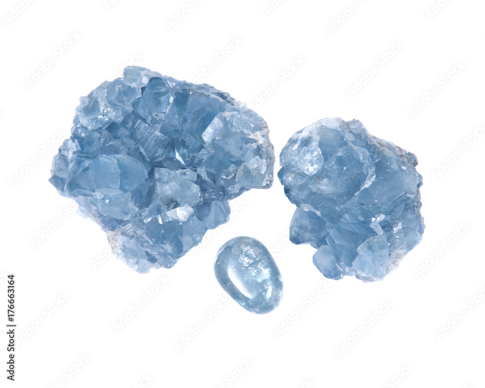 Blue celestite cluster and polished celestite palm stone isolated on white background