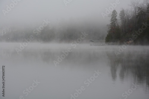 Fog on mountain lake