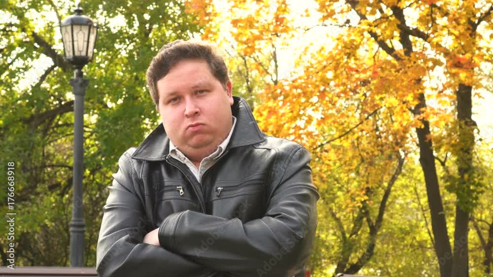 Portrait of a serious man in a black leather jacket Portrait of a serious man in a black leather jacket
