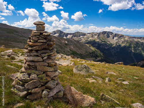 Rock Cairn on Mountain Trail in Rocky Mountains © Jonathan