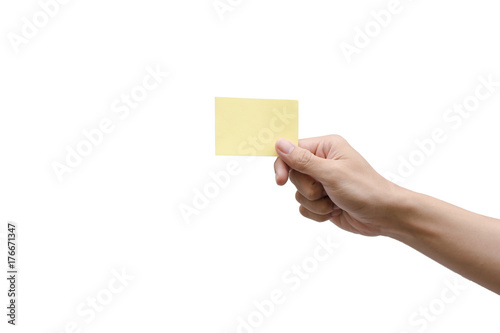Hand holding yellow paper isolated on white with clipping path