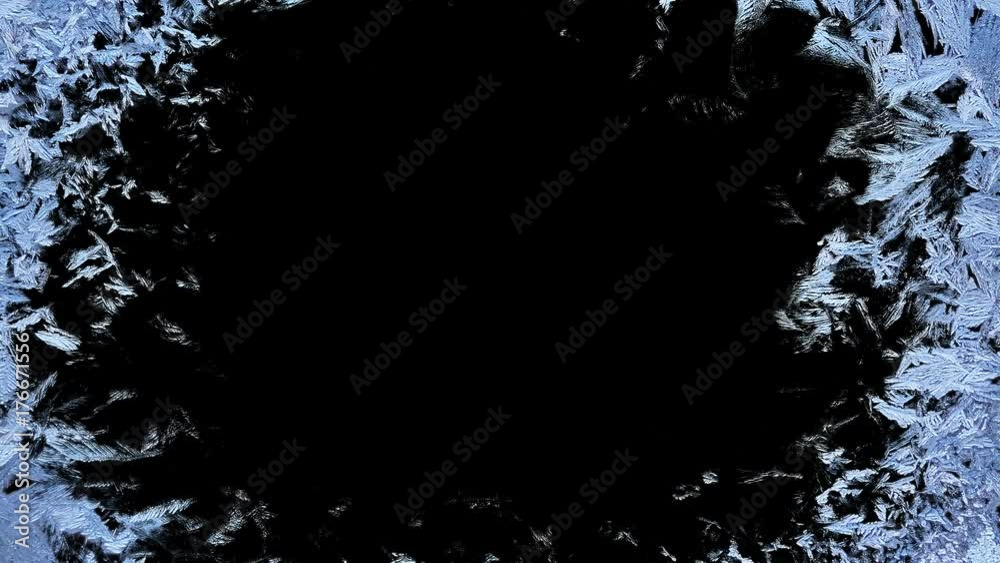 Beautiful window freezing animation from borders to center, timelapse frost forming transition, natural crystal icing, isolated on black background with black and white luminance matte, alpha channel.