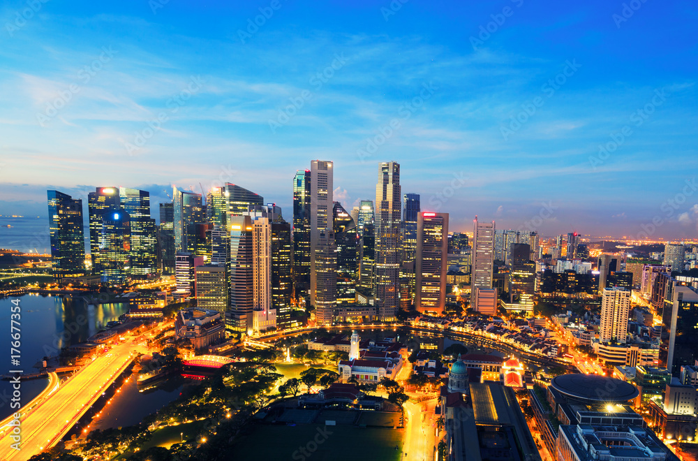 Singapore business district and city at twilight in Singapore, Asia.