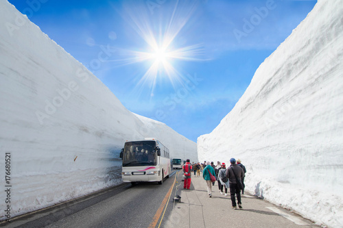  The snow mountains wall of Tateyama Kurobe alpine  with blue sky  background is  one of the most important and popular natural place in Toyama Prefecture, Japan. photo