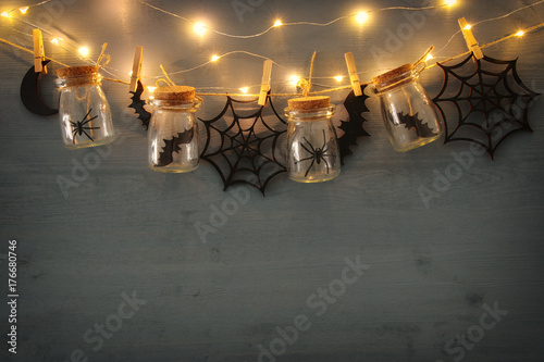 Halloween decoration with spiders and bats in jars