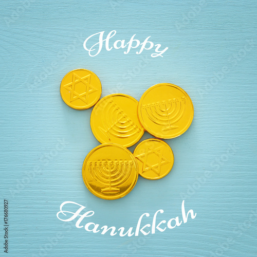 jewish holiday Hanukkah image background with traditional chocolate coins photo