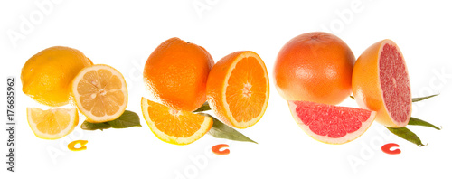 Lemon, orange, grapefruit and chopped slices on white