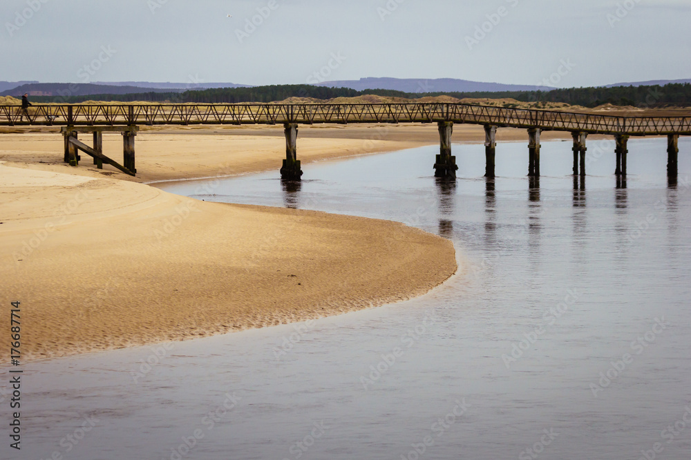 Fototapeta premium Bridge over the beach