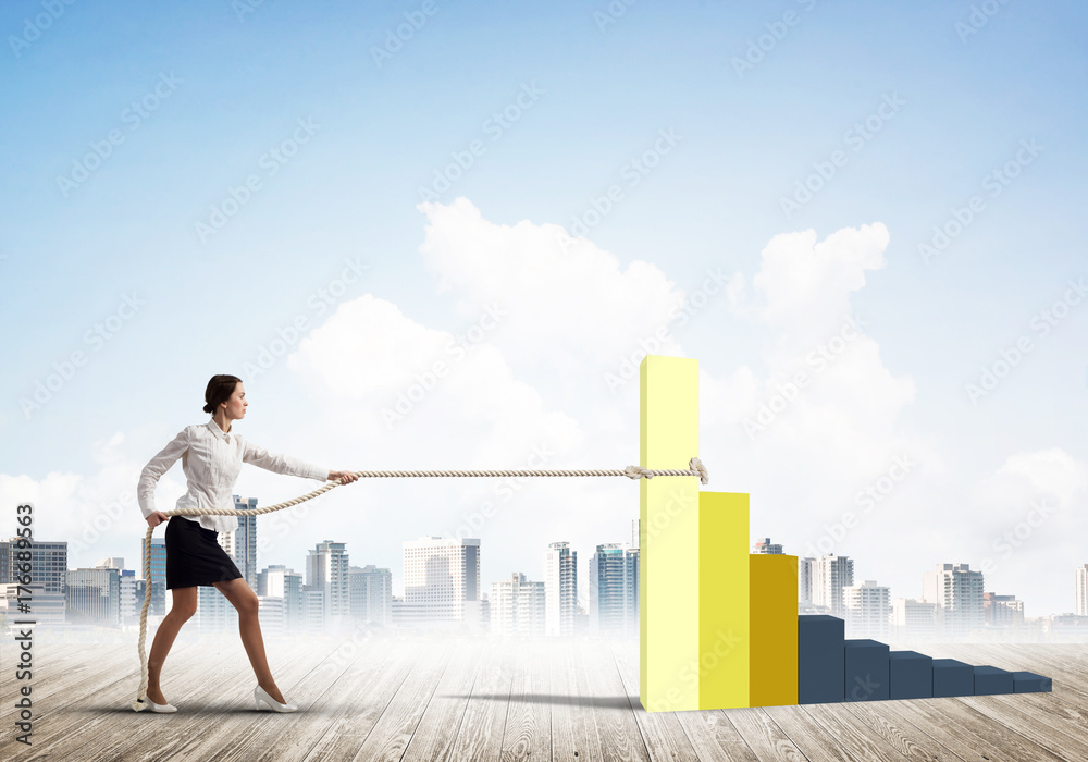 Businesswoman pulling arrow with rope and making it raise up