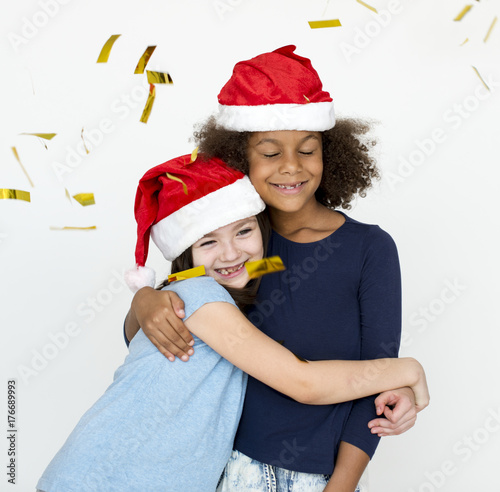 two girls celebrating a Christmas time