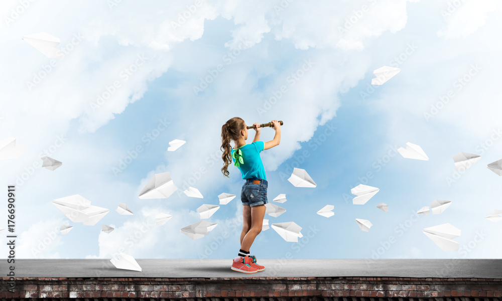 Concept of careless happy childhood with girl exploring this world Concept of careless happy childhood with girl exploring this world