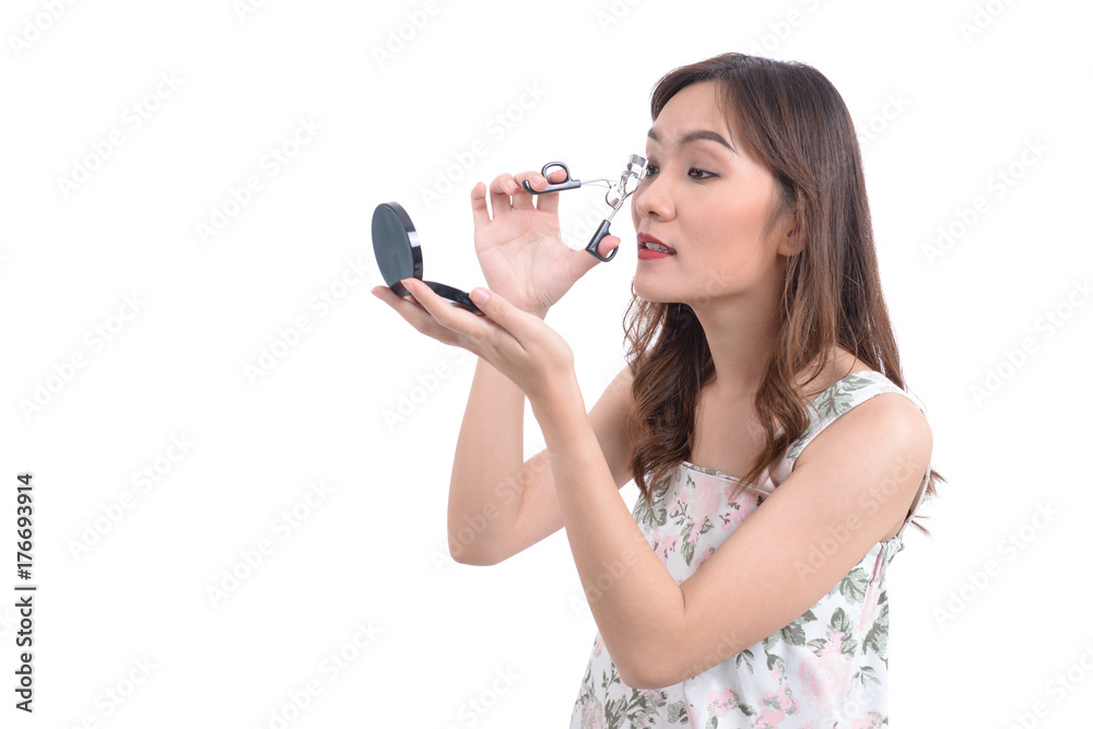 Beautiful women's makeup, use eyelash clamp to bend. Beautiful women's makeup, use eyelash clamp to bend.