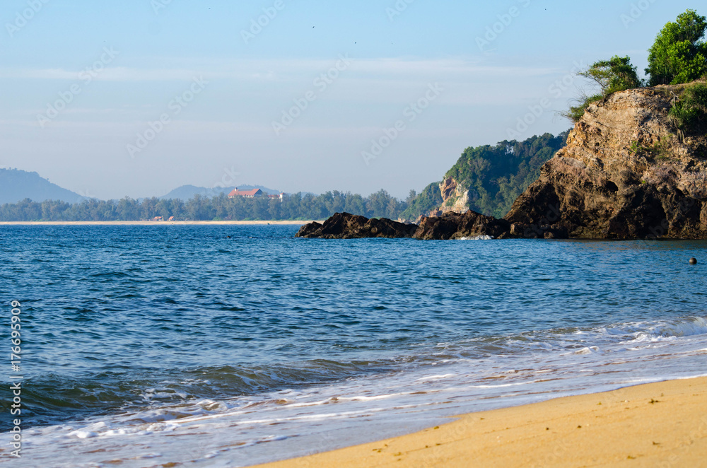 Vacation and peace concept.Beautiful tropical beach, soft wave hitting sandy beach under brighr sunny day