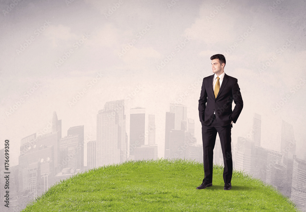 man standing in front of city landscape man standing in front of city landscape