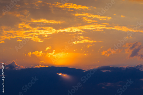 Background of gold clouds in the blue sky before sunset.