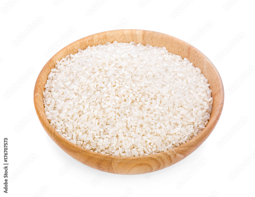 Japanese rice in a wooden on a white background Japanese rice in a wooden on a white background
