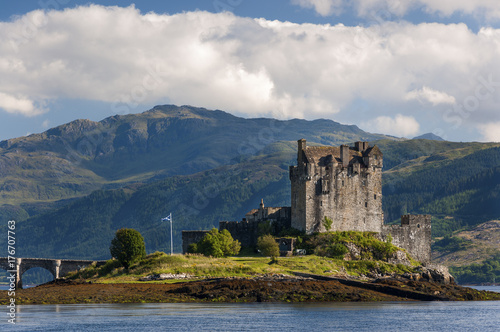 View of the Eilean Donan Castle in the Highlands of Scotland, United Kingdom; Concept for travel in Scotland