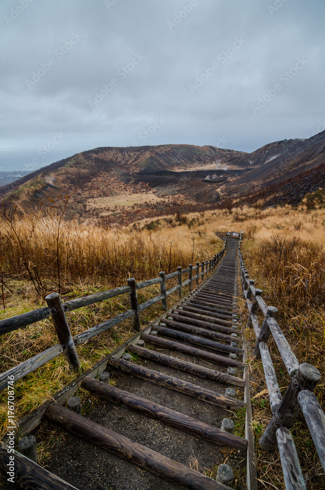 Panoramic view of Mount Usu. Mount Usu is an active stratovolcano in the Shikotsu-Toya National Park, Hokkaidō, Japan. It has erupted four times since 1900. To the north lies Lake Toya.