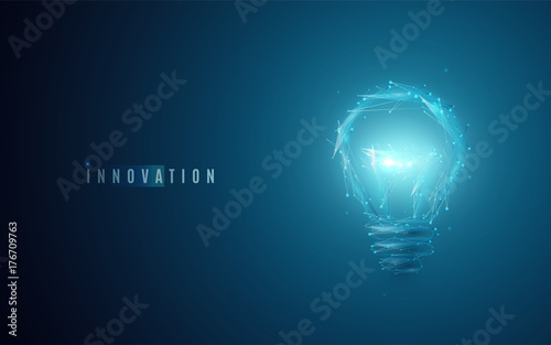 Innovation concept. Lightbulb in modern polygonal style with light effect photo