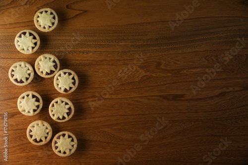Christmas Mince Pies on a wooden surface