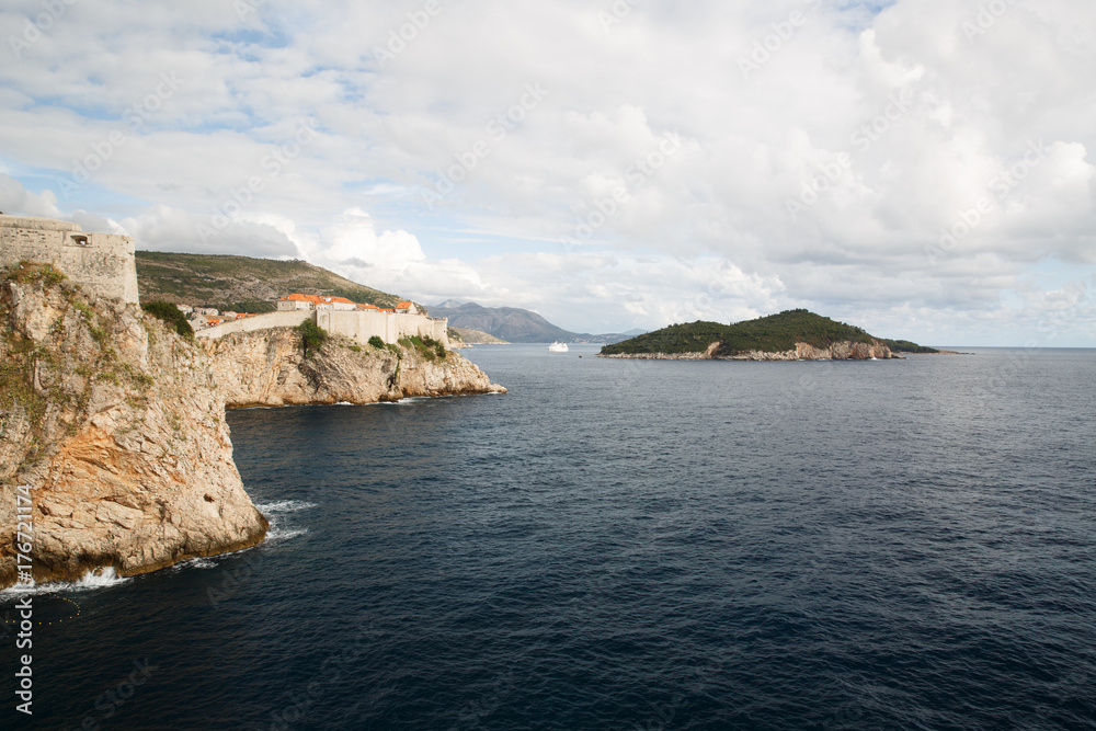 Adriatic sea with the island Lokrum and the old city walls of Dubrovnik. Croatia Adriatic sea with the island Lokrum and the old city walls of Dubrovnik. Croatia