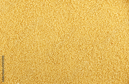 Couscous grain close up background photo