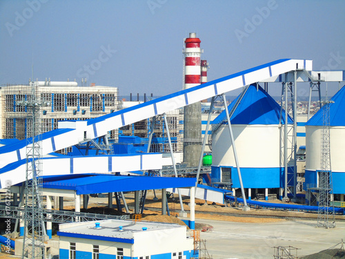 Buildings and structures at an industrial woodworking plant.