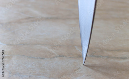 knife on a marble table