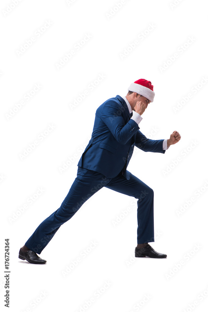 Young busnessman wearing santa hat in christmas concept on white Young busnessman wearing santa hat in christmas concept on white