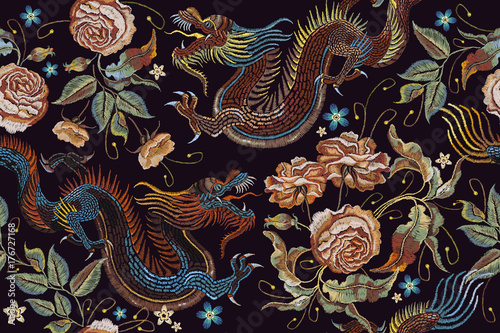 Embroidery vintage chinese dragons and flowers peonies seamless pattern. Classical embroidery asian dragons and beautiful peonies seamless pattern. Art dragons t-shirt design. Clothes, textile art