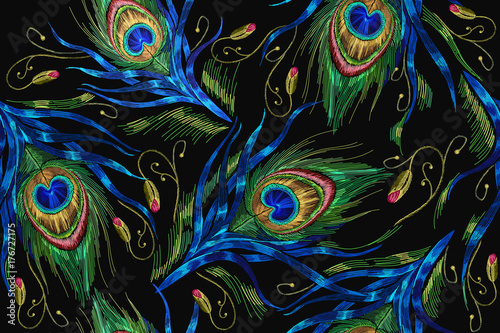 Embroidery peacock feathers seamless pattern. Classical fashionable embroidery beautiful peacocks feathers. Fashionable template for design of clothes. Tails of peacocks vector