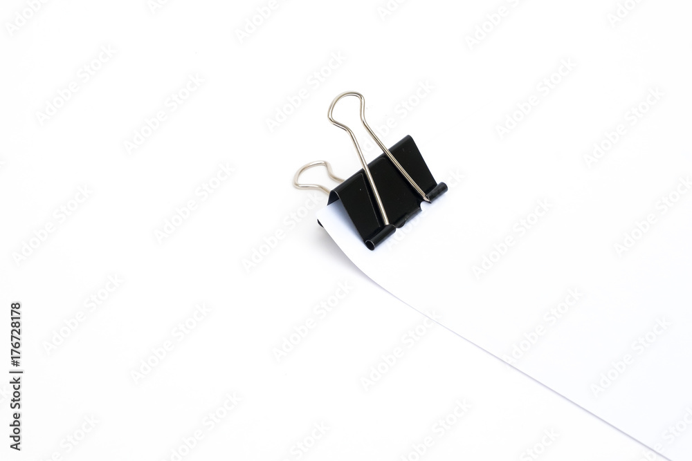 black paper clip (binder) with paper on white background black paper clip (binder) with paper on white background