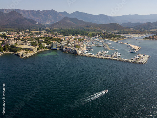 Vista aerea del paese di Saint Florent, Corsica. Francia. Porto barche e case photo