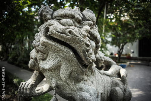 Bangkok Thailand: guardian dogs at Wat Nang Chee Chotikaram Temple photo