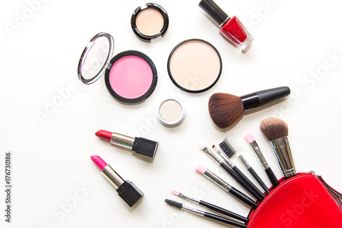 Makeup cosmetics tools background and beauty cosmetics, products and facial cosmetics package lipstick, eyeshadow on the white background. Lifestyle Concept.