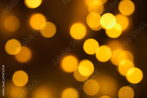Abstract gold circular bokeh background