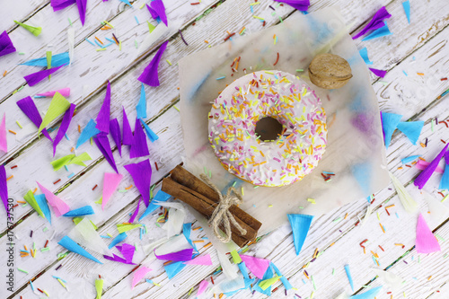 Donut on a wooden white background
