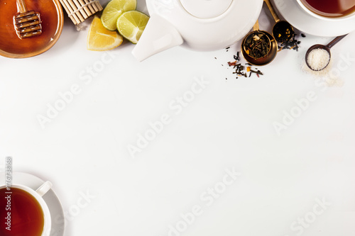 Background of tea composition with crockery photo