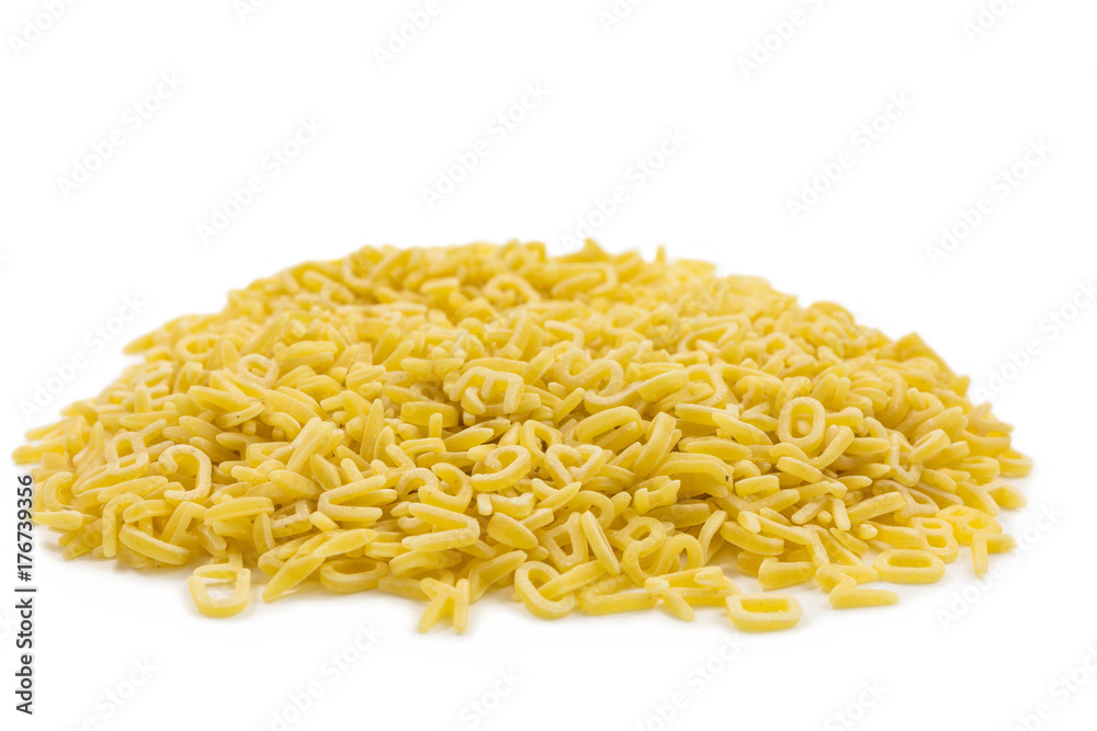 pile of raw pasta in the form of letters and numbers pile of raw pasta in the form of letters and numbers