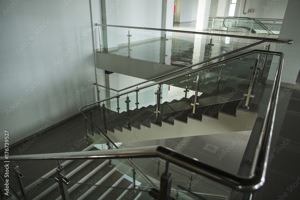 Interior with large windows and stairs Interior with large windows and stairs