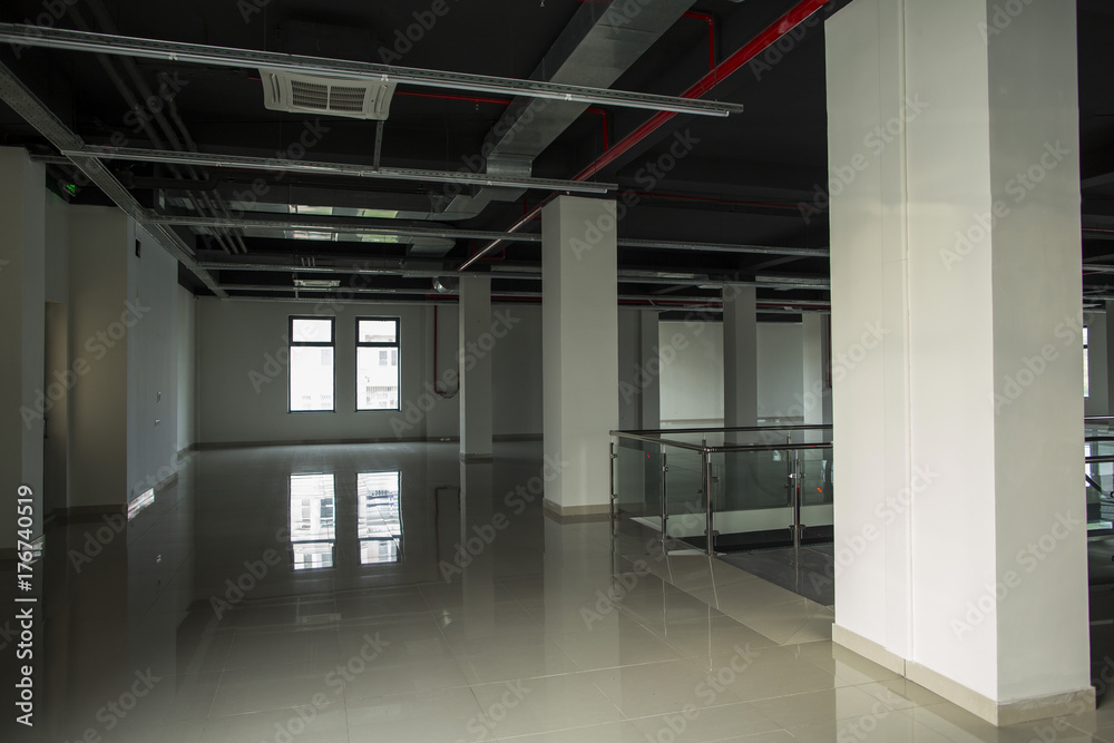 Interior with large windows and columns Interior with large windows and columns